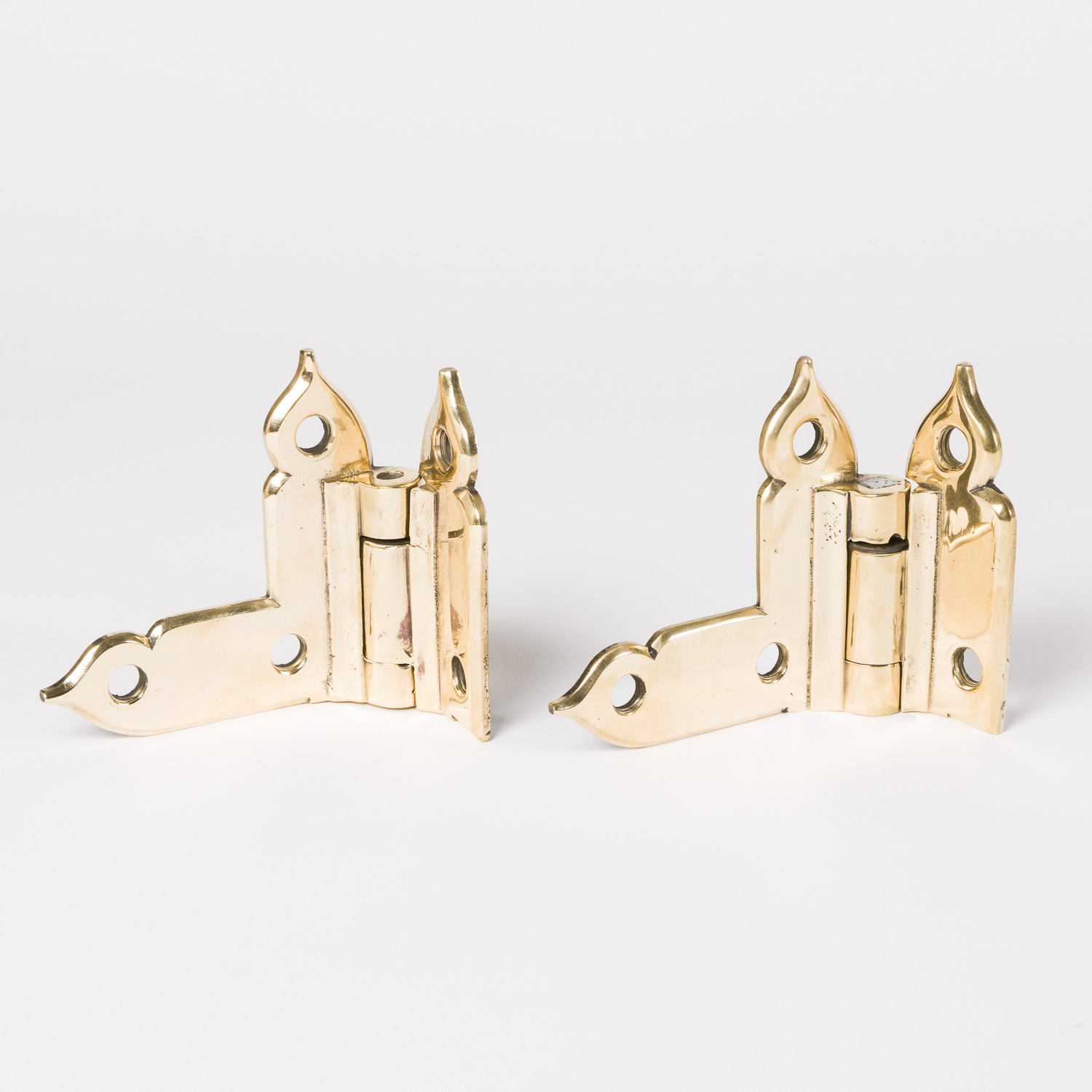 Pair of brass hinges in the Gothic style