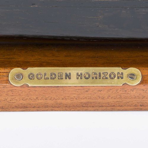model of a three mast sailing ship Golden Horizon name plate